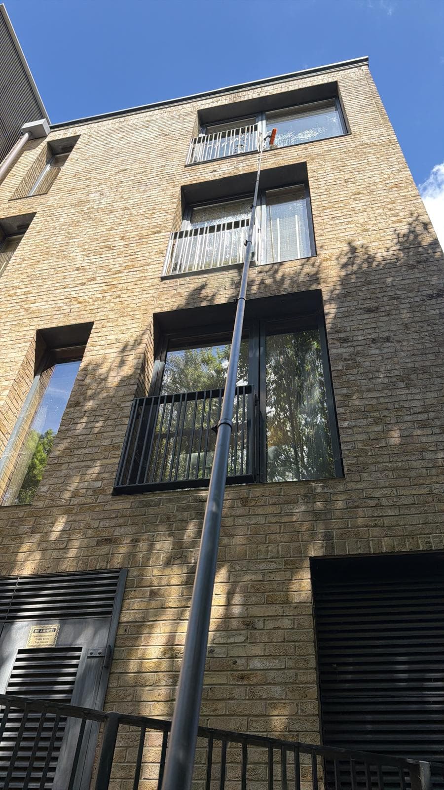High-reach window cleaning